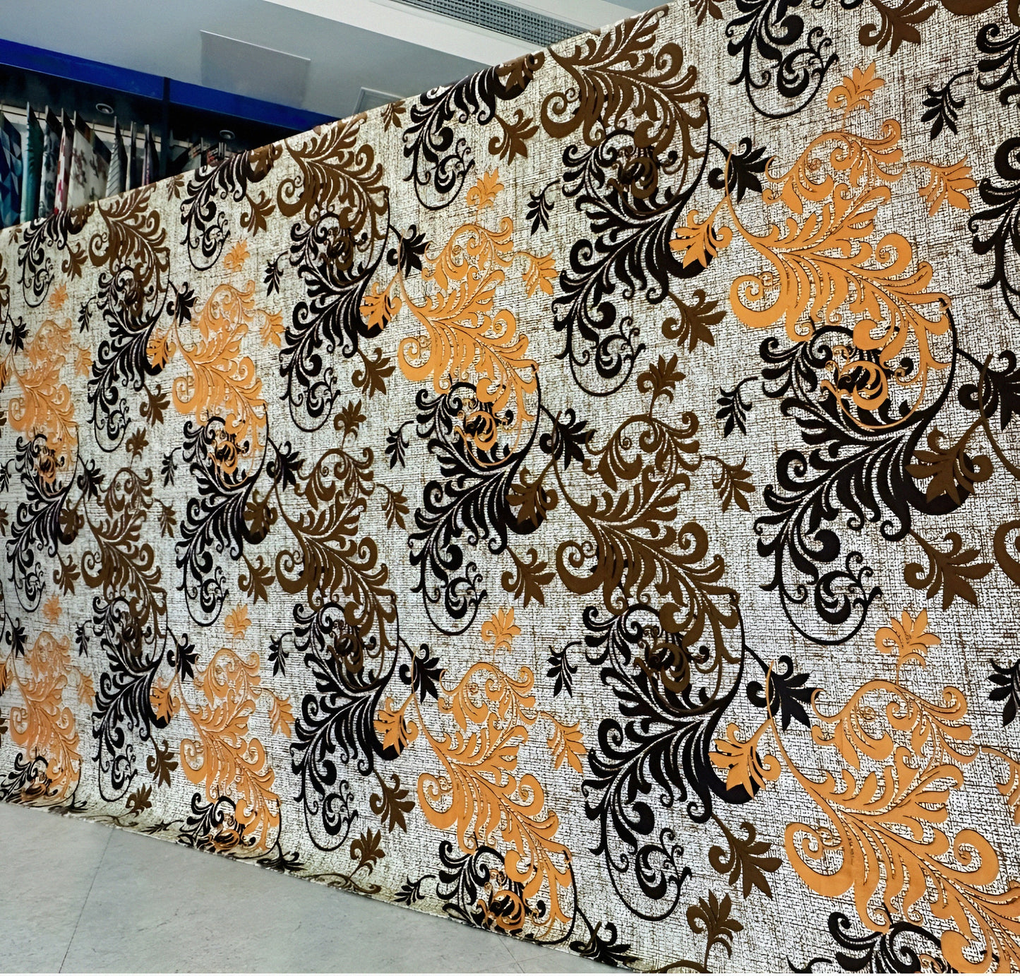 Close-up of Marjan3x bedsheet fabric showing soft breathable cotton texture and matching decorative pillow.