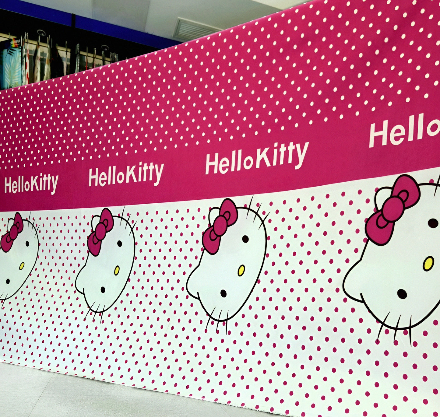 Official Hello Kitty pink mixed-cotton bedsheet roll displayed for wholesale buyers — available Single to King.
