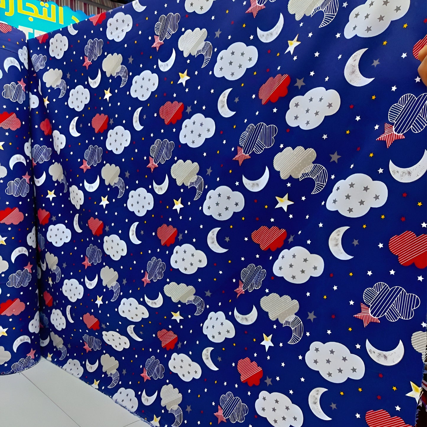 Cloud, star and moon print blue cotton bedsheet — soft, breathable & machine-washable.