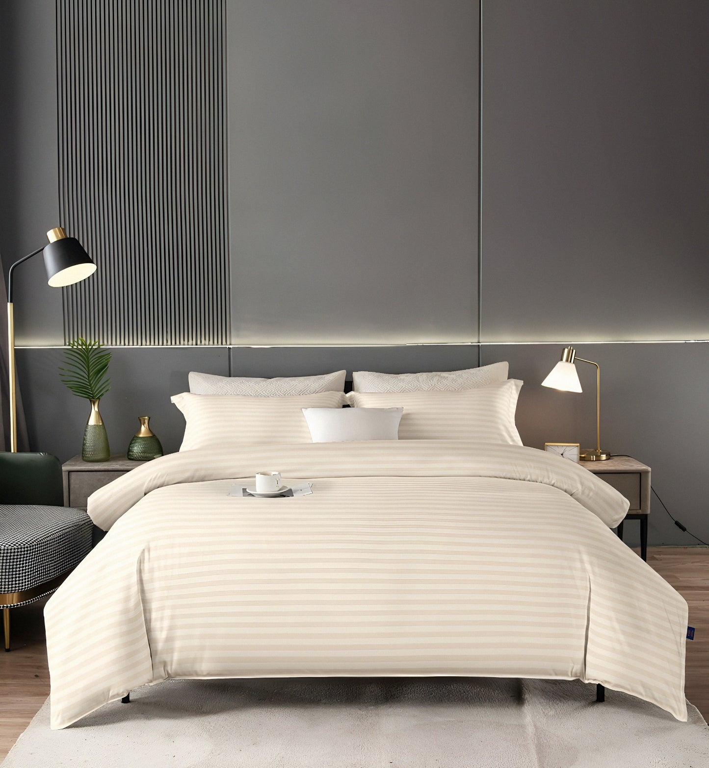 Neatly made bed with beige bedding in a modern bedroom setting.