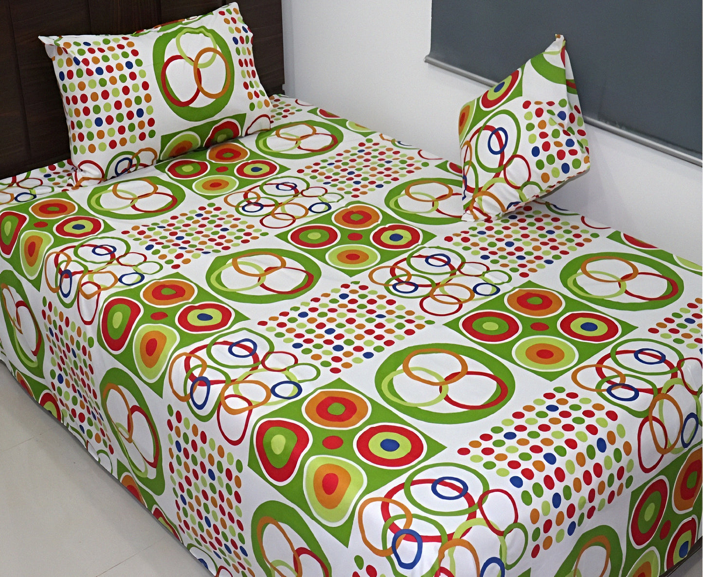 Wholesale cotton bedsheet with colorful circle and dot design for resale.
