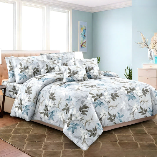 Blue floral bedsheet on a styled bed — طقم ملاية زهرية زرقاء على سرير أنيق