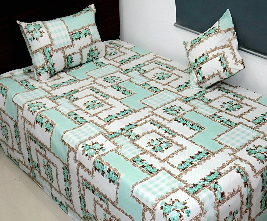 Mint floral cotton bedsheet with matching pillow covers on a bed