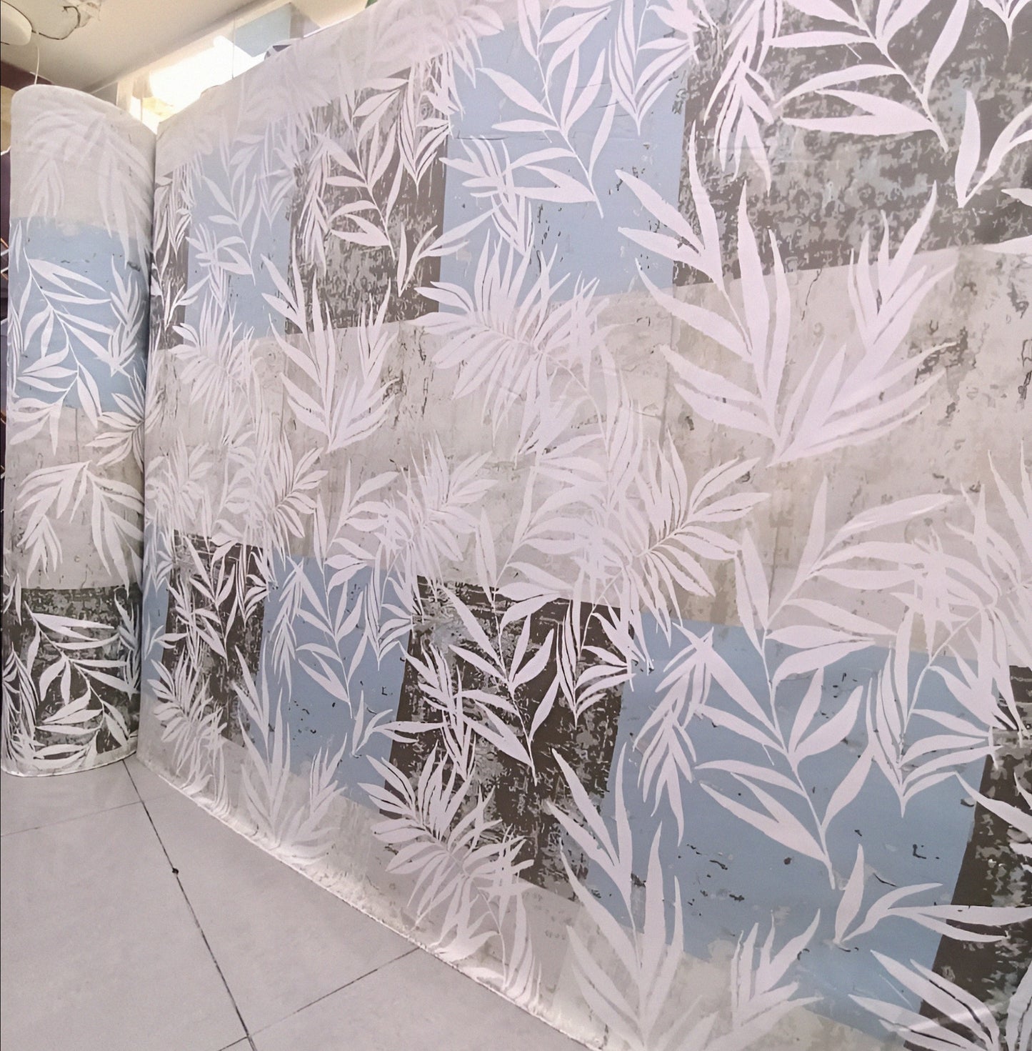 Bedsheet cloth roll with tropical leaf design