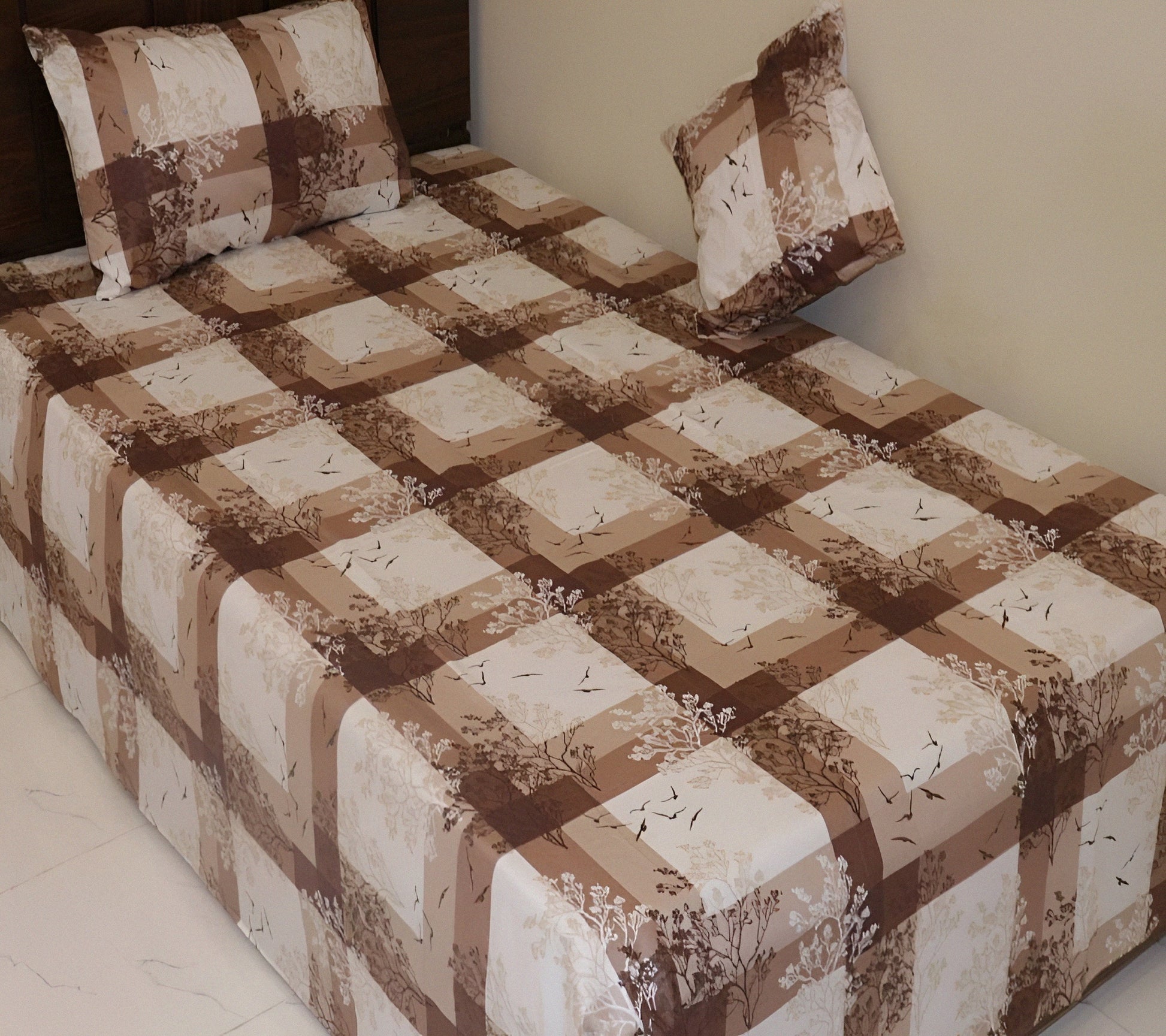 Checked cotton bedsheet set in orange and with pillow covers