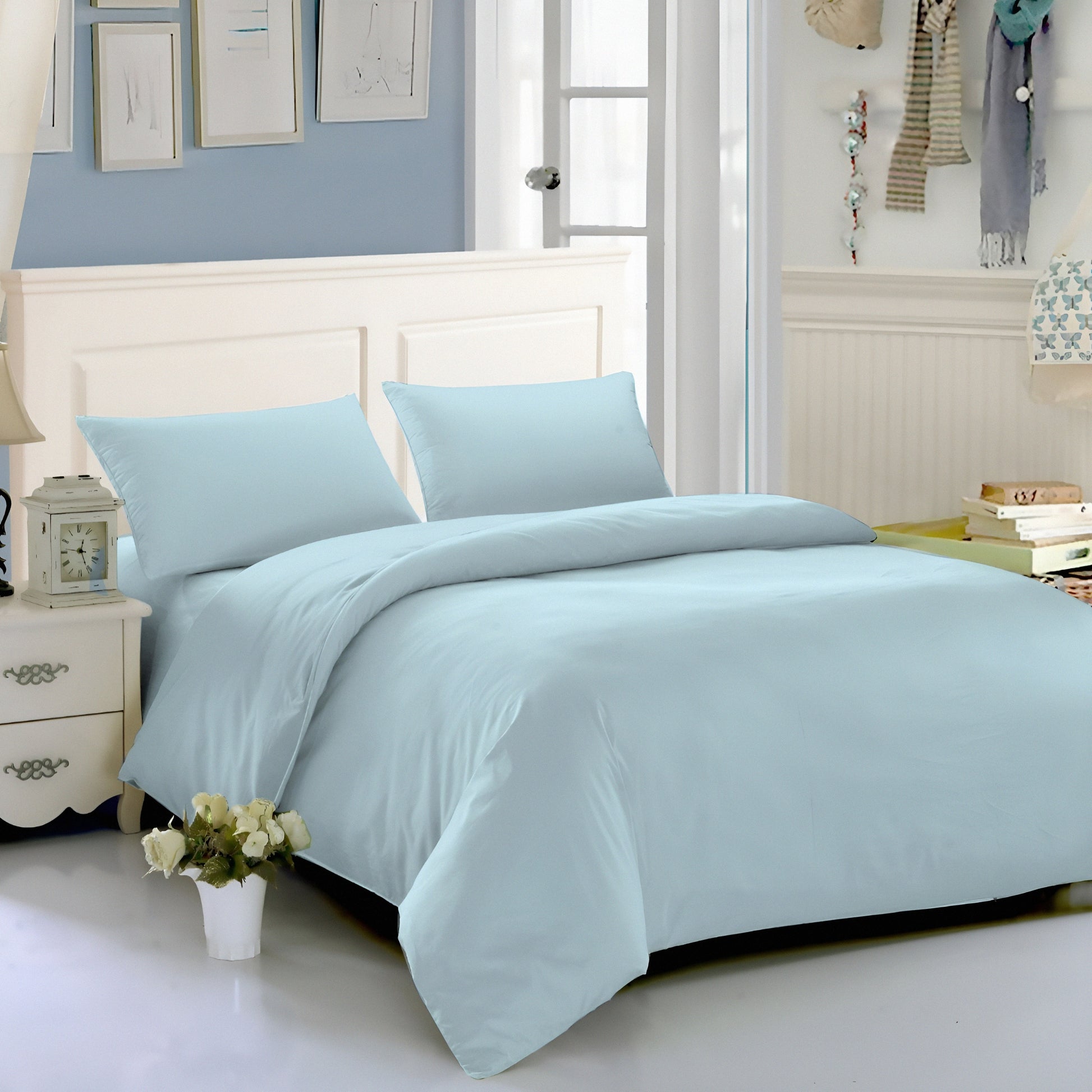 Light blue luxury bedsheet set on modern bed