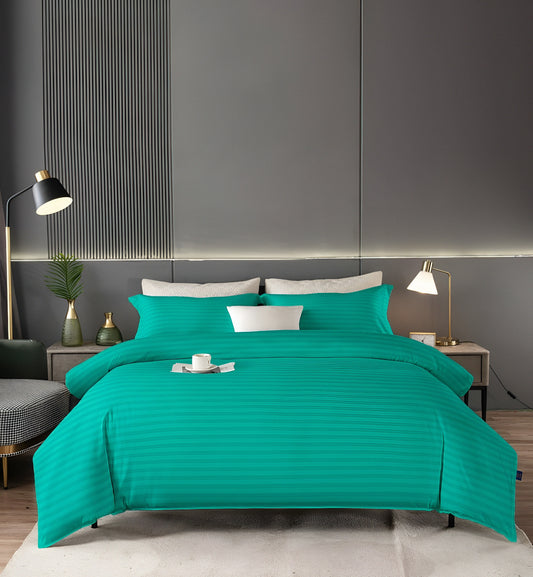 plain cyan mix cotton bedsheet set, neatly folded, showcasing its crisp hotel-quality style.