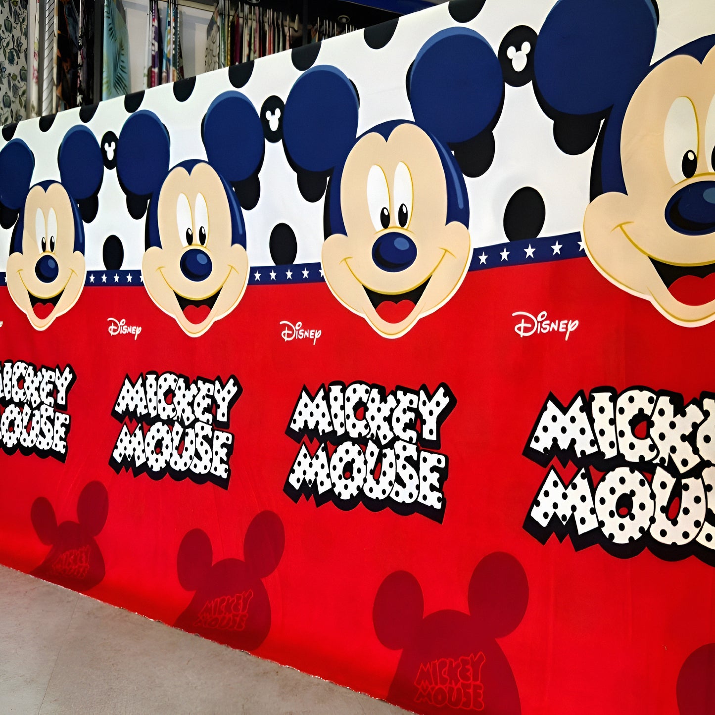 Mickey Mouse cartoon print cotton bedsheet with red base for kids.