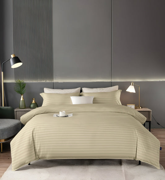 A complete queen-size bedsheet set in deep beige, made from premium ultra-soft microfiber, shown neatly folded.