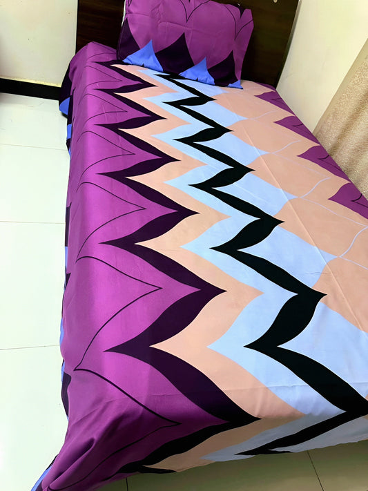 Purple chevron satin bedsheet on single bed — شرشف ساتان بنفسجي بنقشة شيفرون على سرير مفرد.
