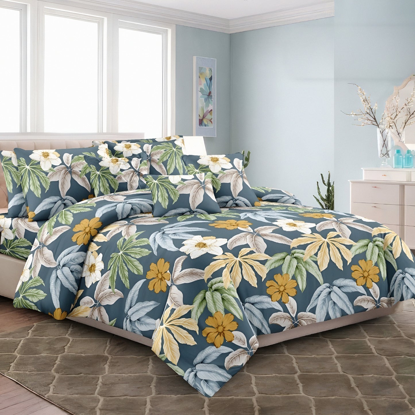 Blue tropical floral bedsheet with green and yellow leaves مفرش سرير أزرق بنقشة زهور استوائية
