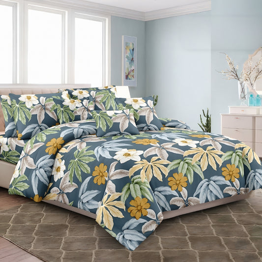 Blue tropical floral bedsheet with green and yellow leaves مفرش سرير أزرق بنقشة زهور استوائية
