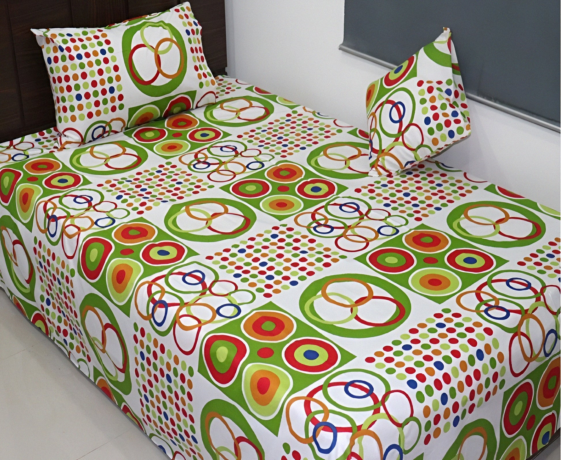 Wholesale cotton bedsheet with colorful circle and dot design for resale.